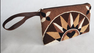 Handmade Wayuu Clutches - from the artisans of the Wayuu Indigenous Group.  Fair Trade from Hands of Colombia.  Gifts that give back: Thread donated to indigenous artisans with every item purchased.